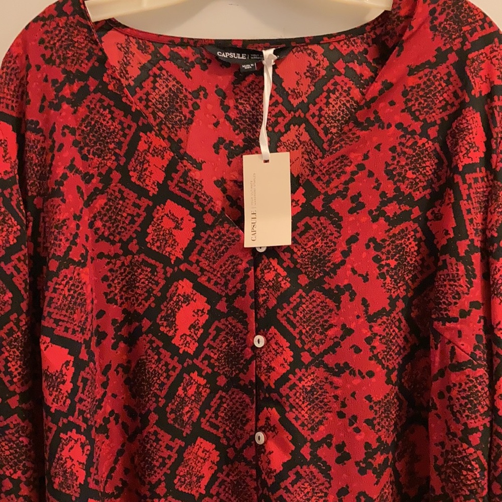 Snakeskin Print Peplum Blouse